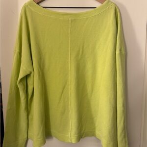From Anthropologie, yellow waffle top, v neck, boxy cut. It feels like an XL